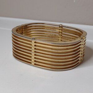 7 Inch Gold Tone Hinged Metal Bracelet